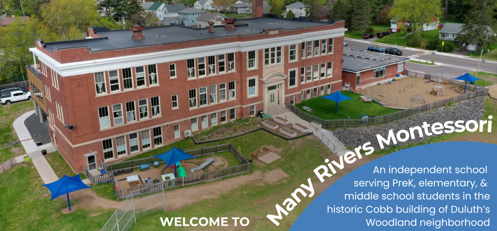 Aerial image of century-old, classic school building including green outdoor spaces and playground equipment with text "Welcome to Many Rivers Montessori" and "an independent school serving PreK, elementary, & middle school students in the historic Cobb building of Duluth's Woodland neighborhood"